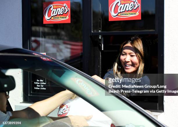 Gardena, CA Olympic gold medalist Chloe Kim surprised guests at Raising Cane's in Gardena on Monday, February 28 serving up chicken fingers at the...