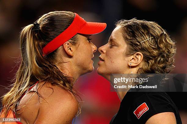 Daniela Hantuchova of Slovakia and Kim Clijsters of Belgium embrace at the net after their third round match during day five of the 2012 Australian...