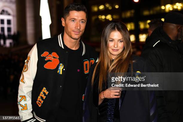 Robert Lewandowski and Anna Lewandowska are seen outside Off-White, during Paris Fashion Week - Womenswear F/W 2022-2023, on February 28, 2022 in...