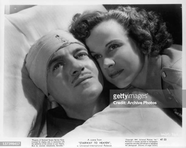 David Niven and Kim Hunter looking up from hospital bed in a scene from the film 'Stairway to Heaven', 1947.