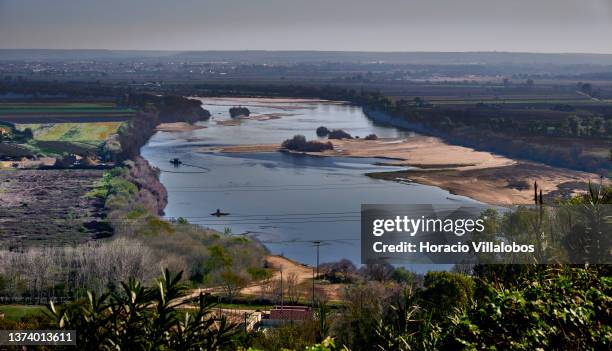 View of Tagus River showing los water level near Santarem on February 28 in Abrantes, Portugal. The country’s winter drought worsens as 91% of the...