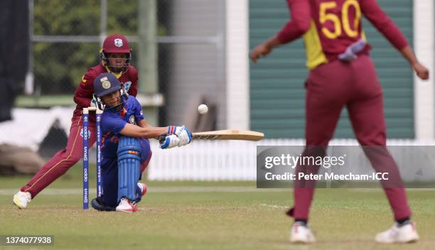 Poonam Yadav of India plays a shot during the 2022 ICC Women's Cricket World Cup warm up match between West Indies and India at Rangiora Oval on...