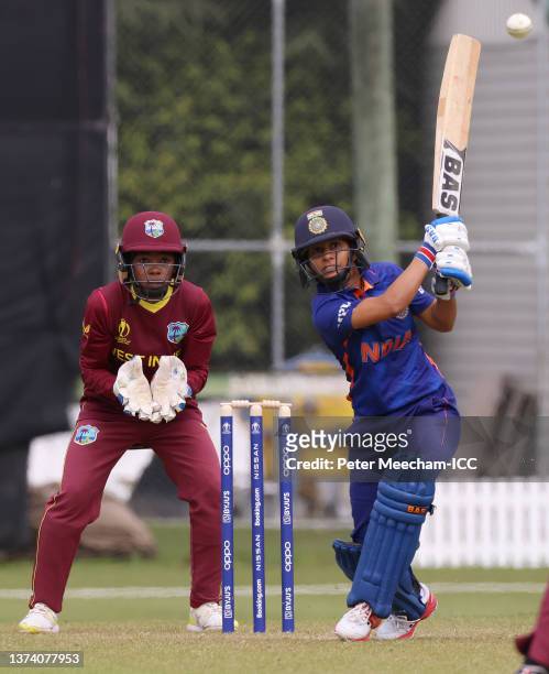 Poonam Yadav of India plays a shot during the 2022 ICC Women's Cricket World Cup warm up match between West Indies and India at Rangiora Oval on...