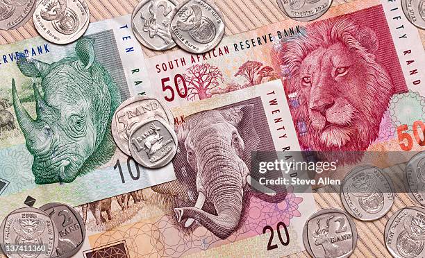 south african banknotes and coins. - south african currency stock pictures, royalty-free photos & images