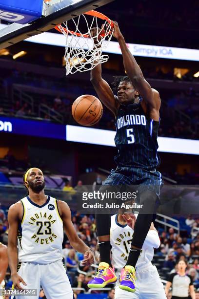 Mo Bamba of the Orlando Magic dunk in the second half against the Indiana Pacers at Amway Center on February 28, 2022 in Orlando, Florida. NOTE TO...