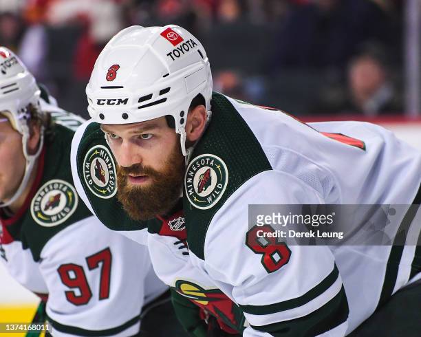 Jordie Benn of the Minnesota Wild in action against the Calgary Flames during an NHL game at Scotiabank Saddledome on February 26, 2022 in Calgary,...