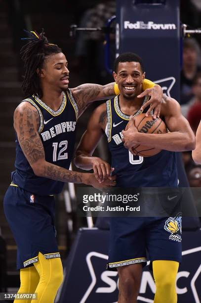 Ja Morant and De'Anthony Melton of the Memphis Grizzlies celebrate during the second half against the San Antonio Spurs at FedExForum on February 28,...