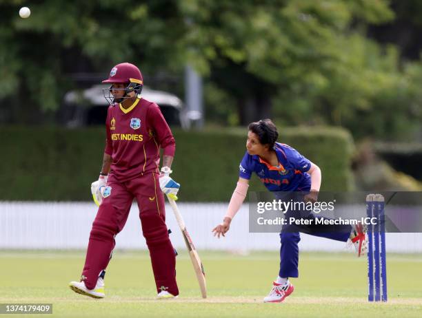 Poonam Yadav from India bowls as Shemaine Campbelle from West Indies looks on during the 2022 ICC Women's Cricket World Cup warm up match between...