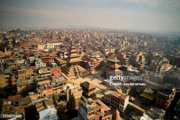 bhaktapur durbar square and surrounding city in nepal - piazza durbar kathmandu stock pictures, royalty-free photos & images
