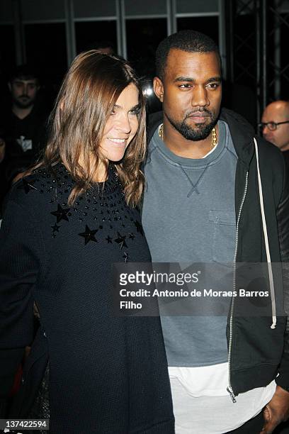 Carine Roitfeld and Kanye West attend during the Givenchy Menswear Autumn/Winter 2013 show as part of Paris Fashion Week on January 20, 2012 in...