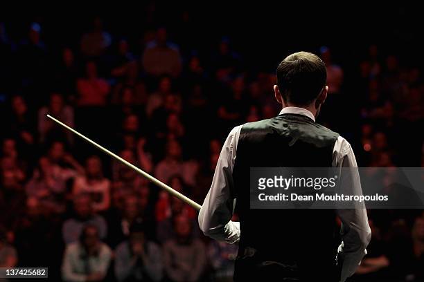 Mark Selby of England gets ready to play a shot during his Quater Final match with Shaun Murphy of England during day six of The Masters at Alexandra...