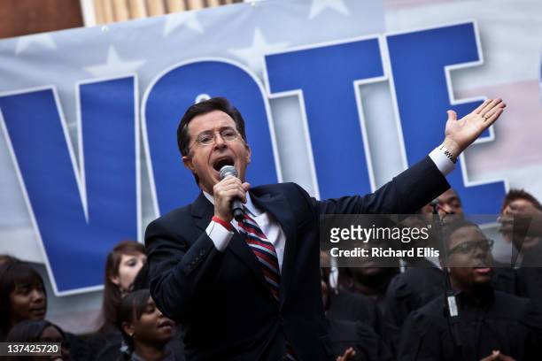 Comedian Stephen Colbert hosts a rally with former Republican presidential candidate Herman Cain at the College of Charleston on January 20, 2012 in...