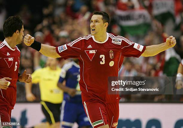 Ferenc Ilyes of Hungary celebrate the score during the Men's European Handball Championship 2012 group C match between France and Hungary at Spens...