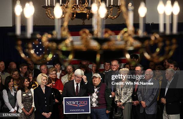 Republican presidential candidate, former Speaker of the House Newt Gingrich, speaks during a town hall style campaign stop with his wife Callista at...