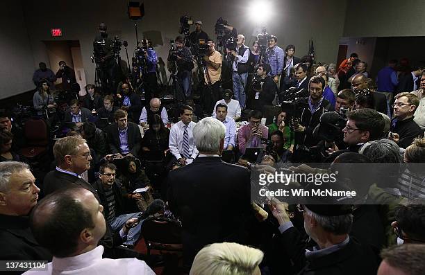 Republican presidential candidate, former Speaker of the House Newt Gingrich, answers questions from the press following a town hall style campaign...