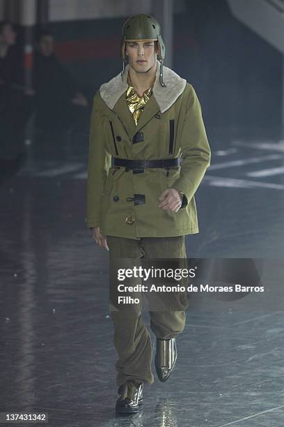 Model walks the runway during the John Galliano Menswear Autumn/Winter 2013 show as part of Paris Fashion Week on January 20, 2012 in Paris, France.