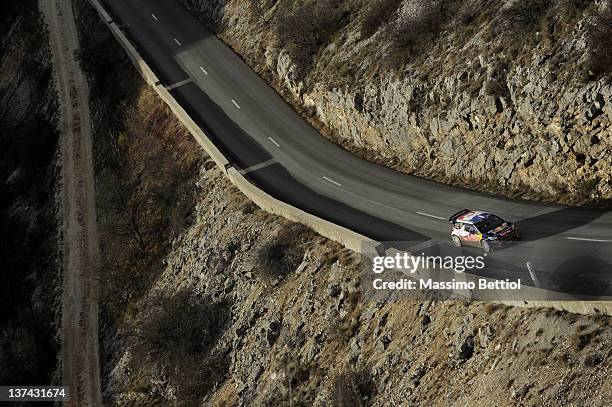 Sebastien Loeb of France and Daniel Elena of Monaco compete in their Citroen Total WRT Citroen DS3 WRC during the WRC Rallye Monte-Carlo on January...