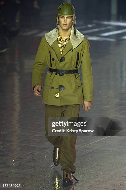 Model walks the runway during the John Galliano Menswear Autumn/Winter 2013 show as part of Paris Fashion Week on January 20, 2012 in Paris, France.