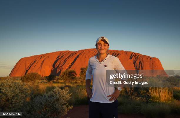 In this Handout Photo provided by Tennis Australia, Ashleigh Barty poses as she visits Uluru in the Uluru-Kata Tjuta National Park, Australia on...