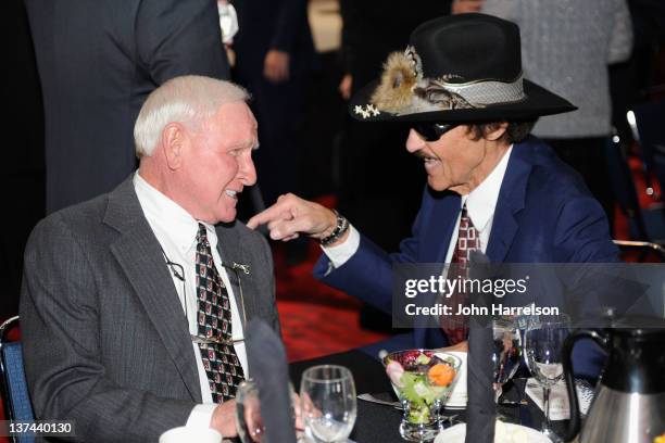 Hall of fame inductee Cale Yarborough and NASCAR Hall of fame member Richard Petty talk before the 2012 NASCAR Hall of Fame induction ceremony at the...