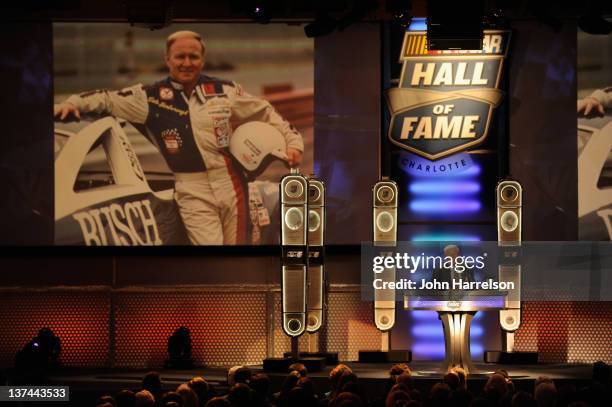 Cale Yarborough speaks as he is inducted into the NASCAR Hall of Fame during the 2012 NASCAR Hall of Fame induction ceremony at the Charlotte...