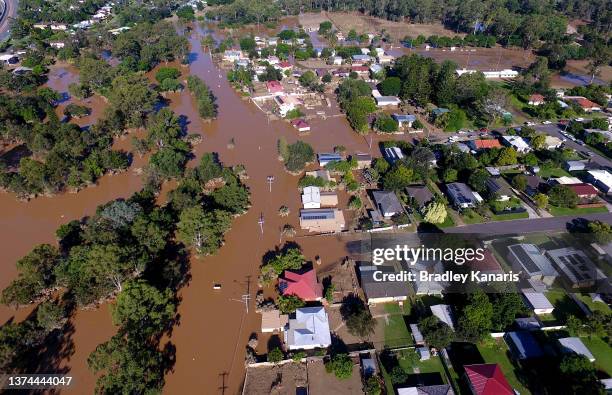 Properties in the suburb of Goodna in the far south-western outskirts of Brisbane are seen inundated by flood waters on March 01, 2022 in Brisbane,...