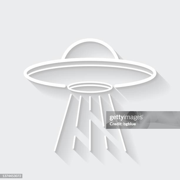 ufo - flying saucer with light beam. icon with long shadow on blank background - flat design - video visit stock illustrations