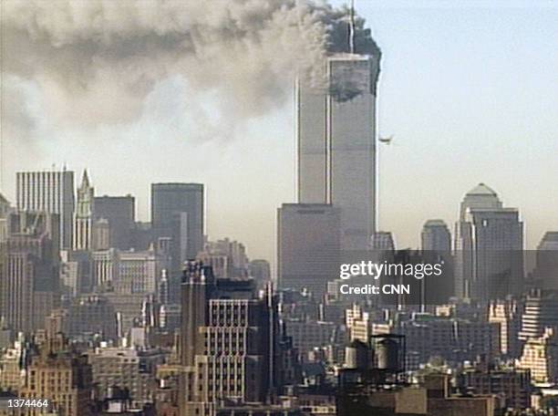 Hijacked United Airlines flight 175 is flown into the south tower of the World Trade Center September 11, 2001 in New York City. The plane is one of...