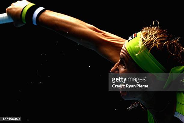 Svetlana Kuznetsova of Russia serves in her third round match against Sabine Lisicki of Germany during day six of the 2012 Australian Open at...