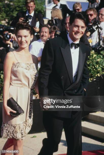 American actress Lara Flynn Boyle and her partner, American actor Kyle MacLachlan attend the 42nd Annual Primetime Emmy Awards, held at the Pasadena...