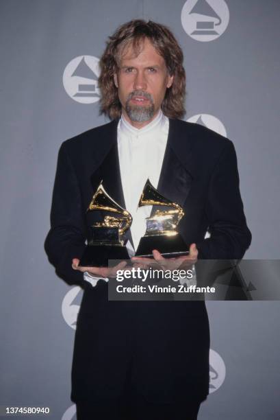 American songwriter and record producer Glen Ballard in the press room of the 38th Annual Grammy Awards, held at the Shrine Auditorium in Los...