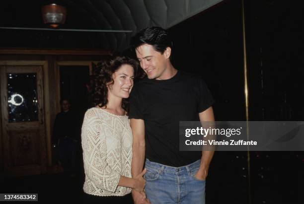 American actress Lara Flynn Boyle and American actor Kyle MacLachlan attend a 'Saturday Night Live' cast and crew party, held at the Tavern On The...