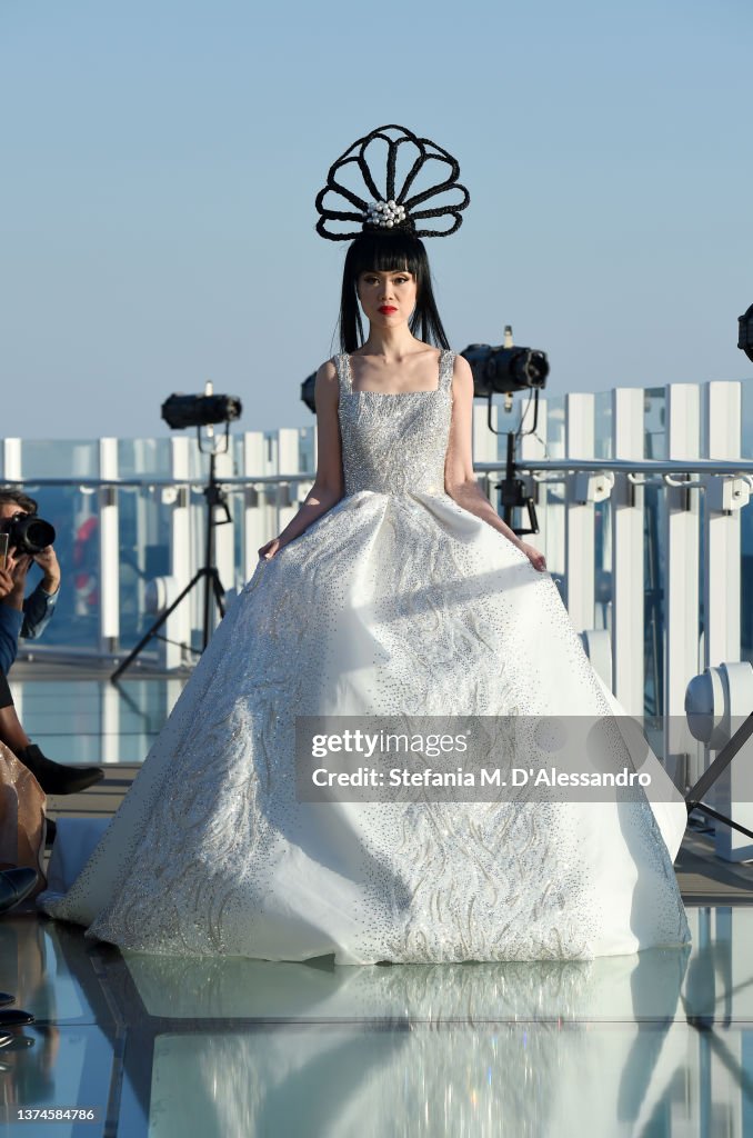 J Spring A model walks the runway at the J Spring fashion show on the Costa ...