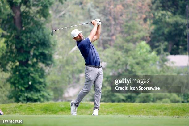 Golfer Ryan Moore plays his tee shot on the 9th hole on June 30 during the second round of the Rocket Mortgage Classic at the Detroit Golf Club in...