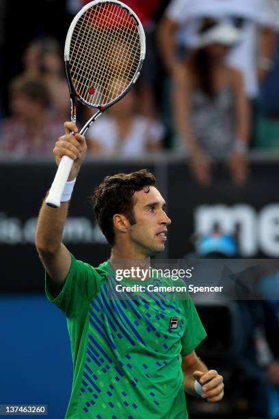 Mikhail Kukushkin of Kazakhstan celebrates winning his third round match against Gael Monfils of France during day six of the 2012 Australian Open at...