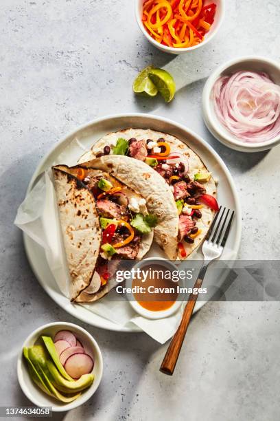 mexican beef tacos with toppings - taco stock pictures, royalty-free photos & images
