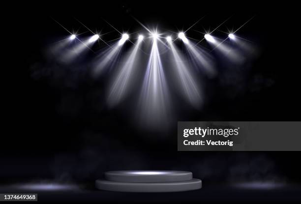 studio background with realistic podium spotlight - decorating stage stock illustrations