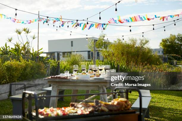 place setting on table during asado party - argentina traditional food ストックフォトと画像