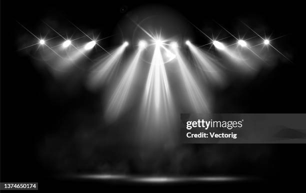 studio background with realistic podium spotlight - electric light stock illustrations