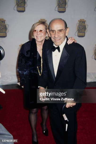 American baseball player Yogi Berra and his wife, Carmen Berra , attend the Sports Illustrated 20th Century Sports Awards, held at Madison Square...
