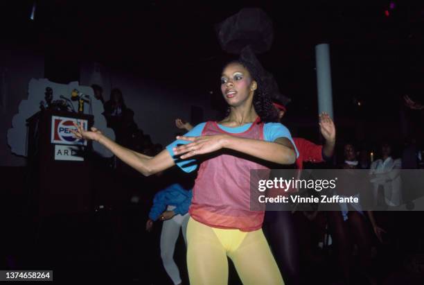 Dancers breakdancing at a nightclub, circa 1985.