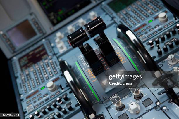 cockpit of mothern commercial airplane...pilot at work - throttle stock pictures, royalty-free photos & images