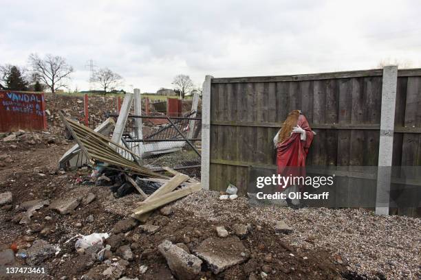 Broken religious figure in the area of the Dale Farm traveller's camp cleared of residents and structures by Basildon Council on January 21, 2012 in...