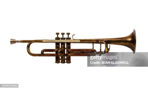 trumpet isolated on white - musical instruments no people stock pictures, royalty-free photos & images