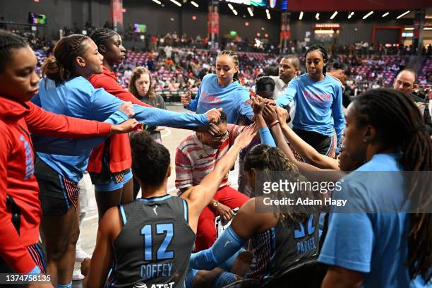 The Atlanta Dream huddle up prior to the game against the Washington Mystics on June 30, 2023 at Gateway Center Arena at College Park in Atlanta,...