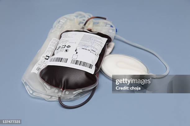 blood bag with red blood cells - blood bag stock pictures, royalty-free photos & images