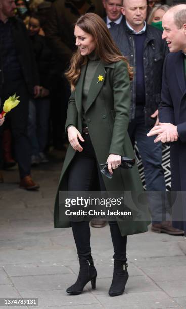 Catherine, Duchess of Cambridge smiles during a visit to Abergavenny Market with Prince William, Duke of Cambridge, to see how important local...