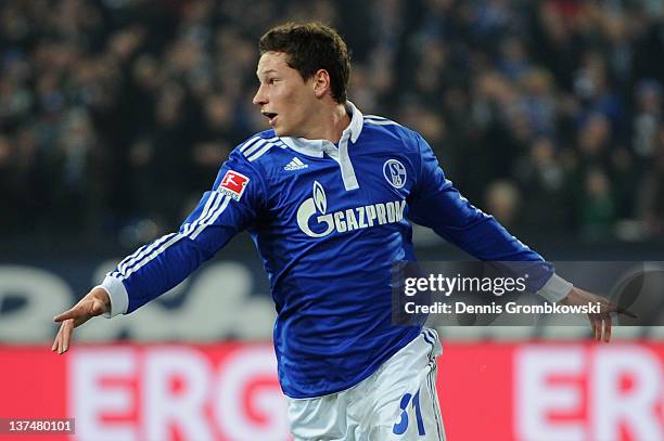 Julian Draxler of Schalke celebrates after scoring his team's third goal during the Bundesliga match between FC Schalke 04 and VfB Stuttgart at...