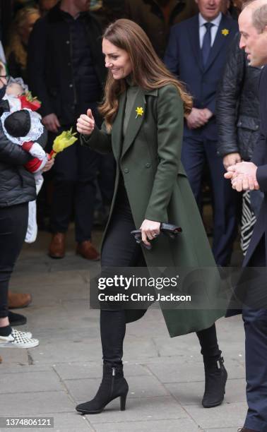 Catherine, Duchess of Cambridge smiles during a visit to Abergavenny Market with Prince William, Duke of Cambridge, to see how important local...