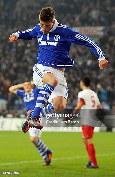 Klaas Jan Huntelaar of Schalke celebrates after scoring an offside goal during the Bundesliga match between FC Schalke 04 and VfB Stuttgart at...
